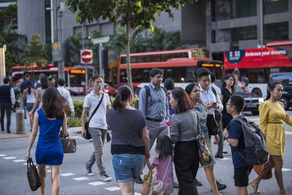People walking on the streets of Singapore's Central Business District (Photo: Getty Images) 