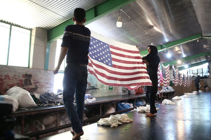 Large flag factory creates U.S. and Israeli flags for Iranian protesters to burn in Khomein City