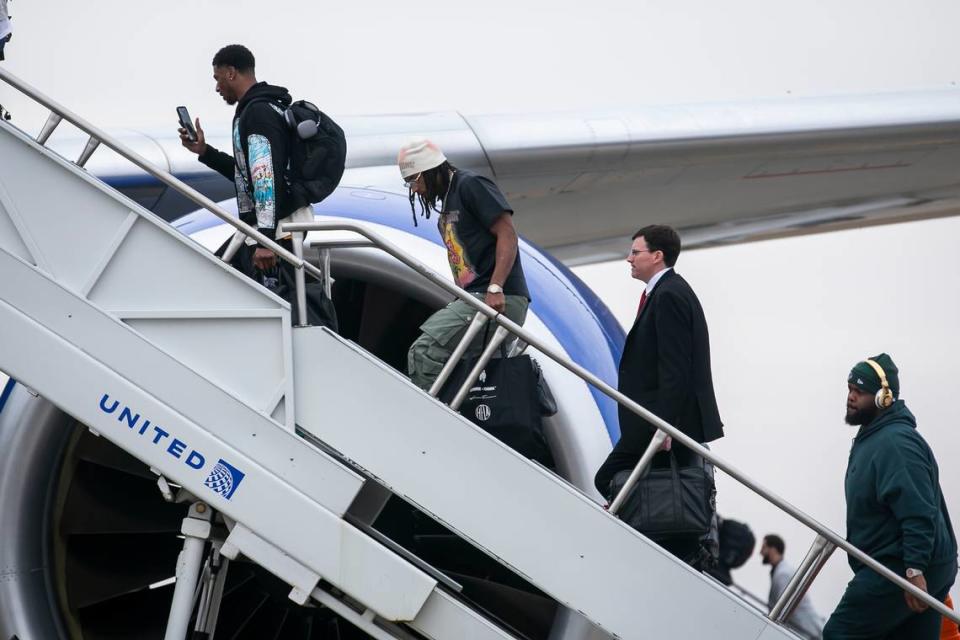 Members of the Kansas City Chiefs board a chartered United flight on their way to Las Vegas for Super Bowl LVIII on Sunday February 4, 2024 at KCI Airport in Kansas City, Missouri.