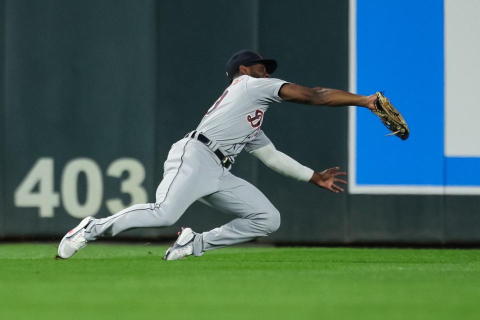 Tigers center fielder Akil Baddoo catches a fly ball hit by Twins first baseman Willians Astudillo for an out in the second inning on Tuesday, Sept. 28, 2021, in Minneapolis.
