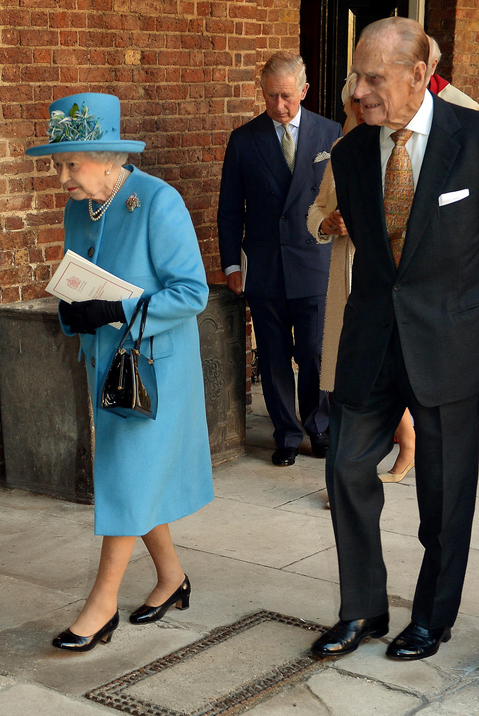 Prince Philip and the Queen are pictured at Prince George's christening in 2013. [Photo: Getty Images]