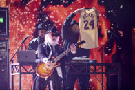 Joseph Simmons holds a jersey of the late Kobe Bryant at the 62nd annual Grammy Awards on Sunday, Jan. 26, 2020, in Los Angeles. (Photo by Matt Sayles/Invision/AP)