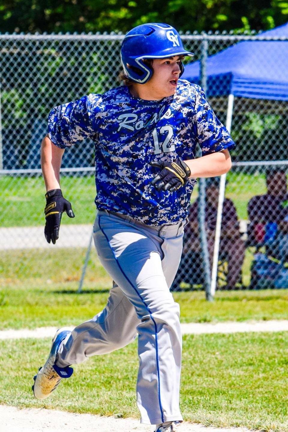 Colo-NESCO's Bradyn Carroll hustles down the line after a pinch-hit RBI single during the Royals' 19-4 win over Melcher-Dallas Saturday at Melcher.