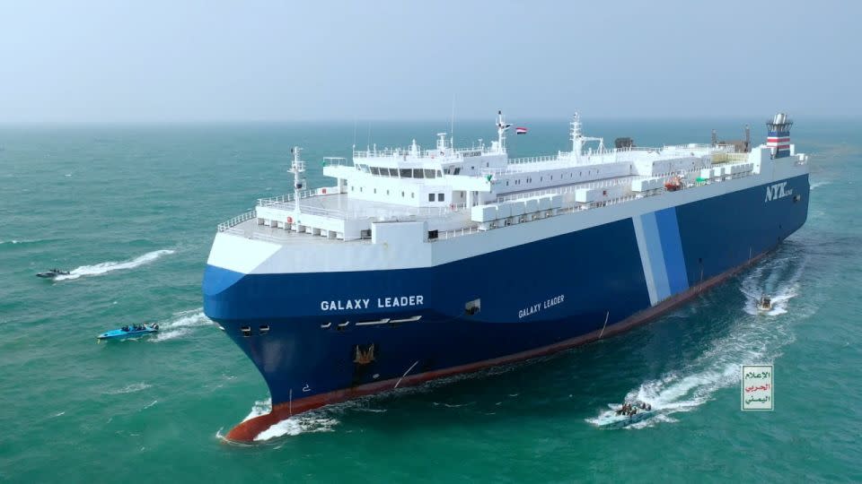 The Galaxy Leader cargo ship is escorted by Houthi boats in the Red Sea in this photo released November 20, 2023. - Houthi Military Media/Reuters