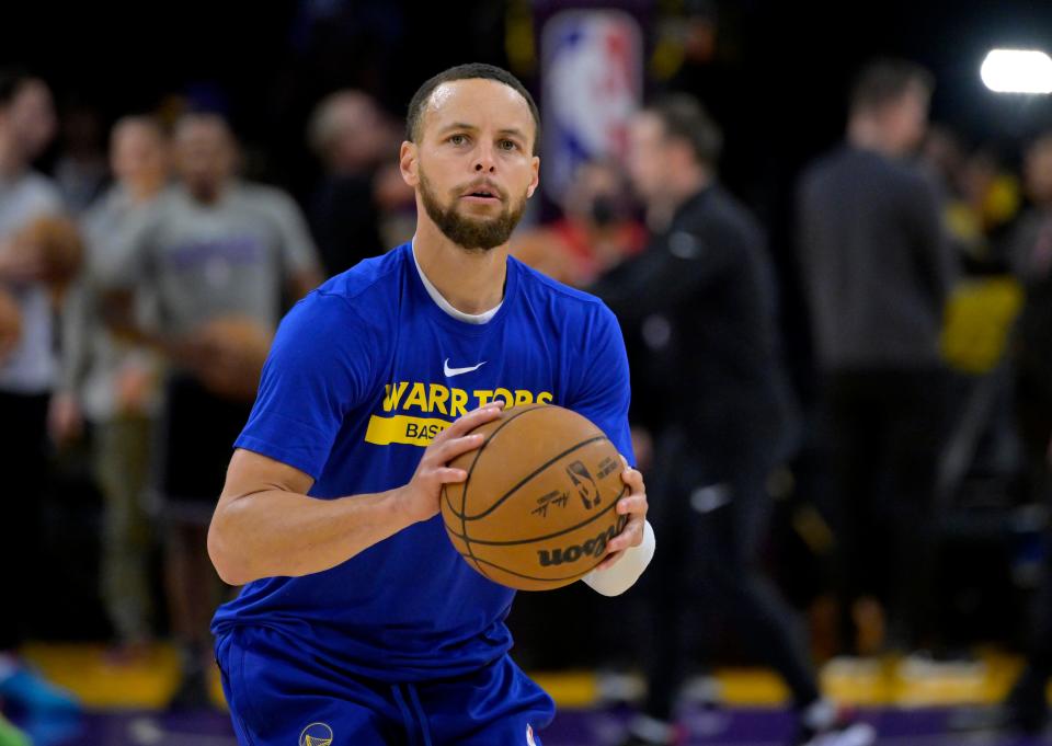 Stephen Curry warms up prior to a Golden State Warriors' playoff game against the Los Angeles Lakers on May 12, 2023.