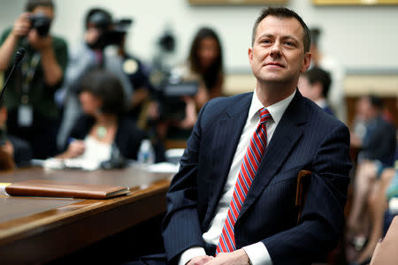 FBI Deputy Assistant Director Peter Strzok waits to testify before the U.S. House Committees on the Judiciary and Oversight & Government Reform joint hearing on "Oversight of FBI and DOJ Actions Surrounding the 2016 Election” in Washington, U.S., July 12, 2018. REUTERS/Joshua Roberts