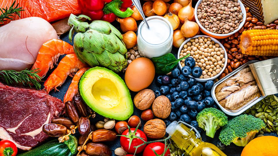 A lower-calorie Mediterranean diet could include proteins such as salmon, chicken breast and tuna, as well as fruits, vegetables, nuts, seeds, legumes and olive oil. - fcafotodigital/iStockphoto/Getty Images