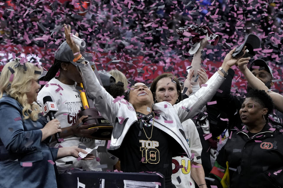 South Carolina head coach Dawn Staley celebrates after the Final Four college basketball championship game against Iowa in the women's NCAA Tournament, Sunday, April 7, 2024, in Cleveland. South Carolina won 87-75. (AP Photo/Morry Gash)