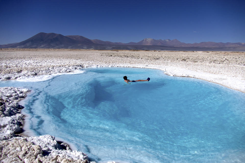 Thomas Power floating in a lagoon near Copiapó, Chile. Photo: Pura Aventura