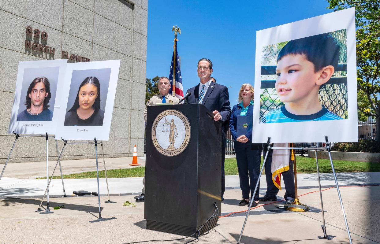 Orange County District Attorney Todd Spitzer announces charges filed against suspects Marcus Anthony Eriz, left, and Wynne Lee, second from left, in the death of Aiden Leos, right (AP)