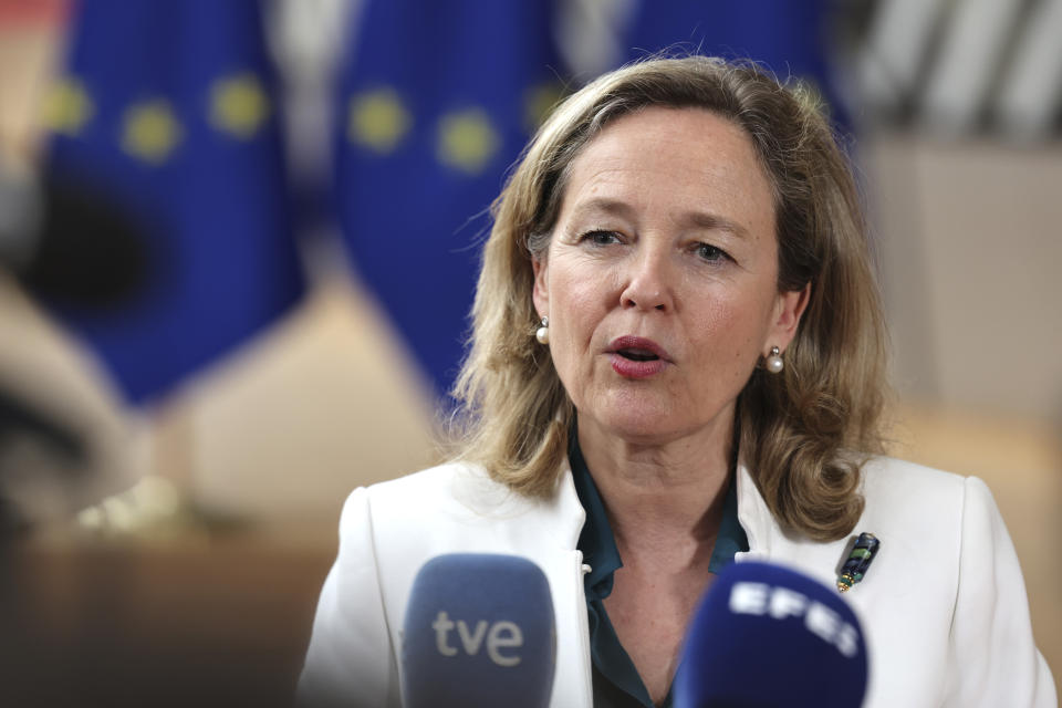 FILE - Spain's Economy Minister Nadia Calvino speaks with the media as she arrives for a meeting of eurozone finance ministers at the European Council building in Brussels, Monday, May 15, 2023. EU finance ministers agreed Friday, Dec. 8, 2023 to back Spain's economy minister, Nadia Calviño, becoming the bank's next president. Calviño, 55, will succeed Werner Hoyer, a German whose second mandate as EIB chief ends Dec. 31. Her candidacy still requires approval from the bank's board of directors and board of governors. (AP Photo/Geert Vanden Wijngaert, File)