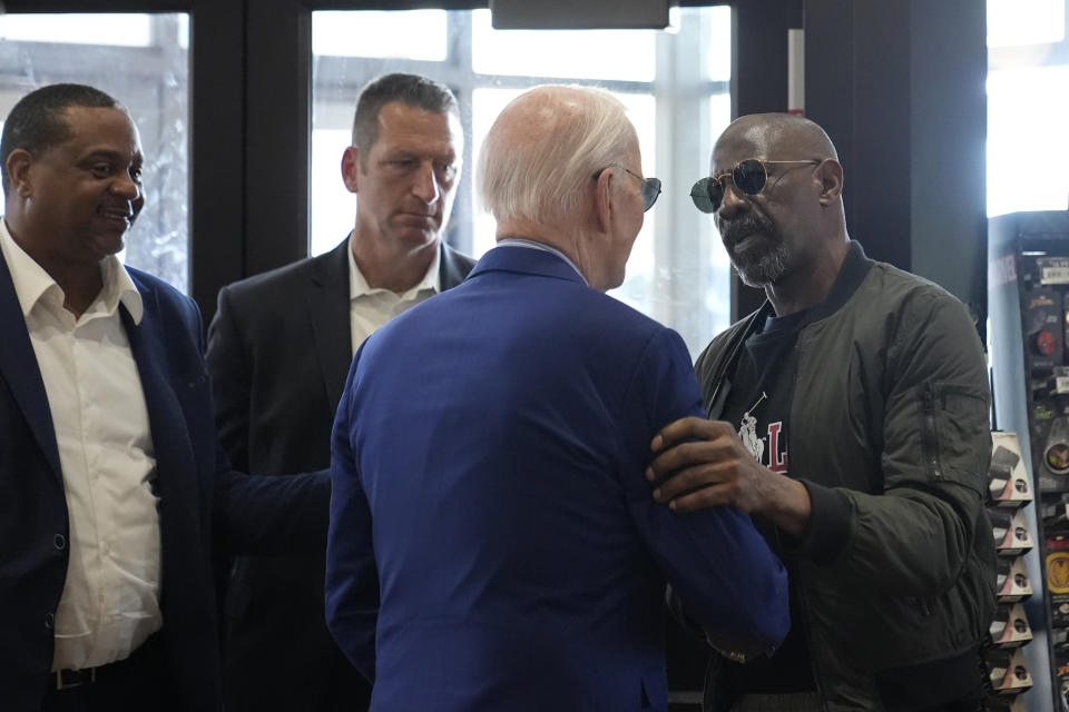 President Joe Biden is greeted after walking into a Sheetz after stopping enroute to Pittsburgh International Airport, Wednesday, April 17, 2024, in Pittsburgh, Pa. (AP Photo/Alex Brandon))