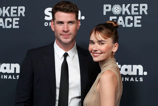 <p>Lisa Maree Williams/Getty</p> Liam Hemsworth and Gabriella Brooks attends the Australian Premiere of Poker Face at Hoyts Entertainment Quarter on November 15, 2022 in Sydney, Australia