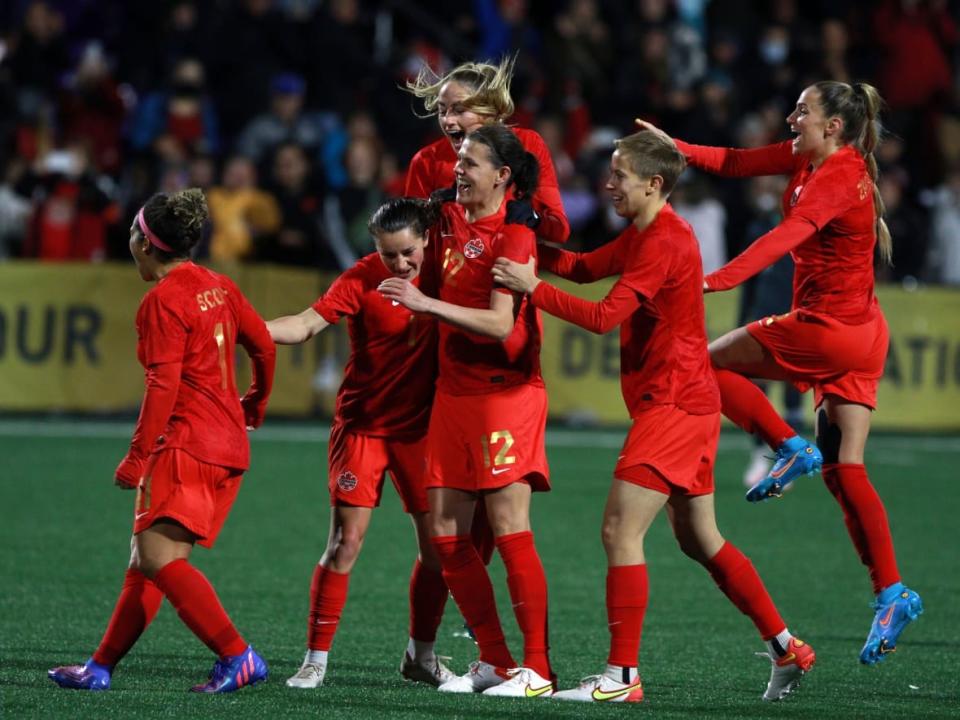 Canada celebrates a goal by Christine Sinclair (12) during a friendly against Nigeria on the celebration tour stop in Langford, B.C., on April 11. (The Canadian Press/Chad Hipolito - image credit)