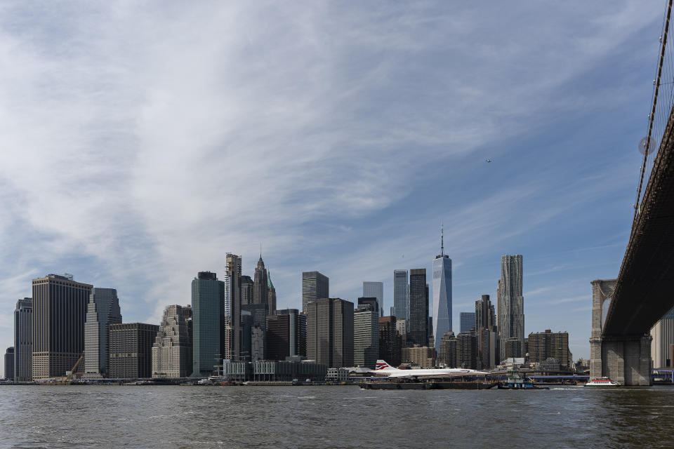 A retired British Airways Concorde supersonic aircraft is transported by barge on the East River, Wednesday, March 13, 2024, in New York. (AP Photo/Peter K. Afriyie)