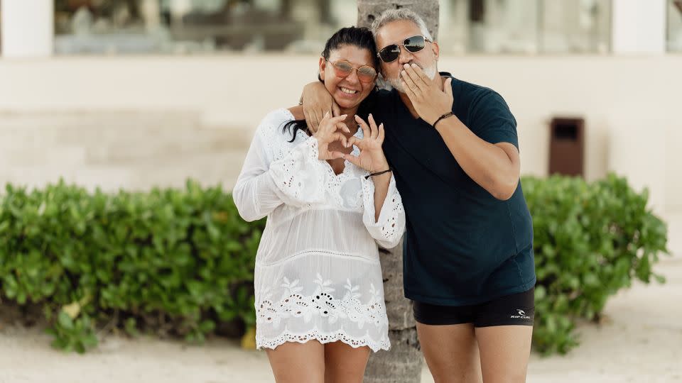 The unknown Argentinian couple expresses their support.  Photographer Ezequiel Marcellini captured images of the unexpected wedding encounter.  -Ezequiel Marcellini Bodas