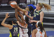 Connecticut Sun forward Emma Cannon battles Dallas Wings guard Alisha Gray, and forwards Isabelle Harrison (20) and Bella Alaire (32) for a rebound during a WNBA basketball game Tuesday, June 22, 2021 at Mohegan Sun Arena in Uncasville, Conn. (Sean D. Elliot/The Day via AP)