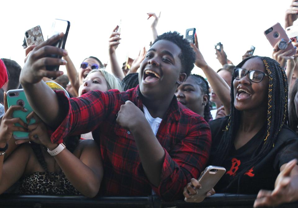 Fans listen as Moneybagg Yo performs Sunday at the 2019 Beale Street Music Festival, part of the Memphis in May International Festival at Tom Lee Park in Downtown Memphis. 