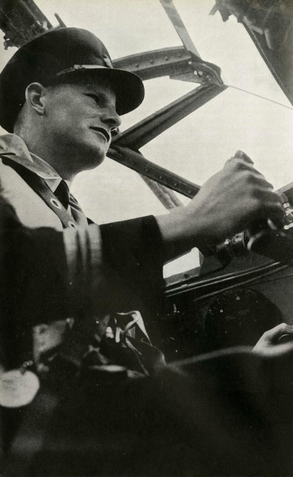 Capt. Gilbert Rae, a BOAC Mosquito pilot, at the controls of his aircraft. Rae was killed when his Mosquito crashed into the North Sea in 1944. <em>Photo by The Print Collector/Getty Images</em>