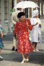 <p>Princess Margaret wears a red polka dot dress to the Queen Mother's 90th birthday at Clarence House on August 4, 1990.</p>