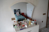 Snow globes, teddy bears and makeup brushes are left behind by Maryam Nouri, who perished this week in an attempt to reach the United Kingdom, in her bedroom of the family home in the town of Soran in the Kurdish semi-autonomous region of northern Iraq, Sunday, Nov. 28, 2021. Nouri, called Baran by her friends and family, drowned this week along with at least 26 others in the English Channel as she was trying to make the illegal crossing to reunite with her fiancée in the United Kingdom. (AP Photo/Hussein Ibrahim)