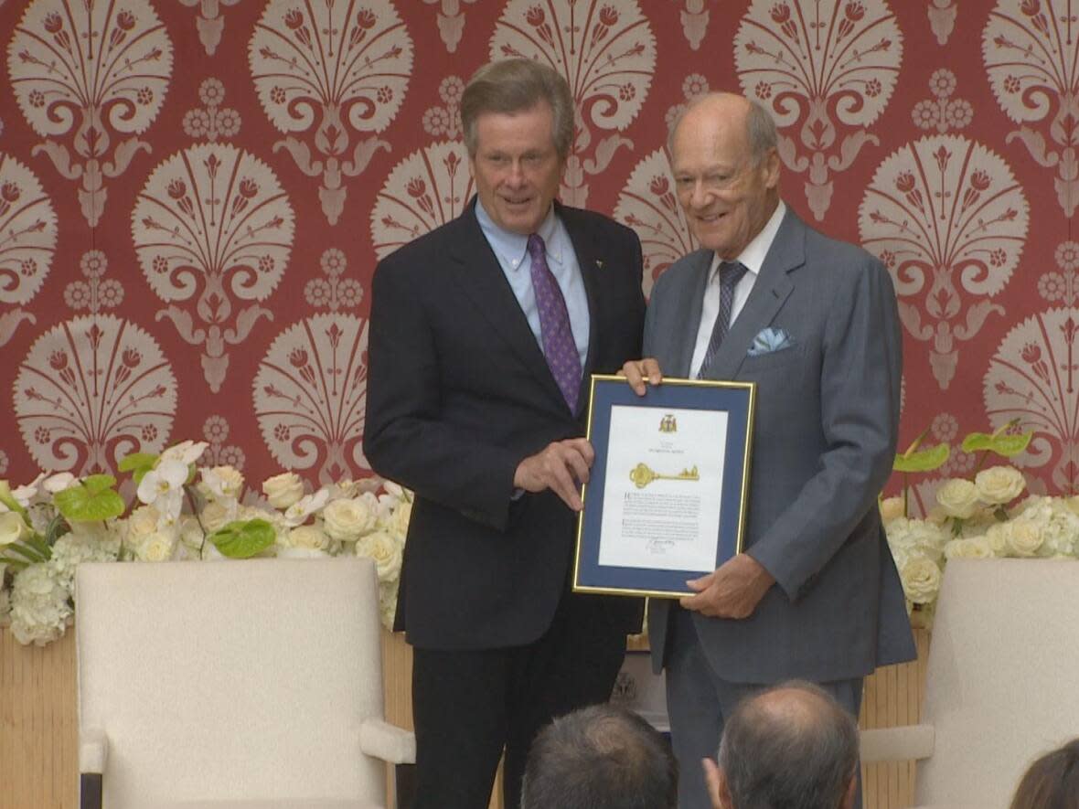 Toronto Mayor John Tory awarded Prince Karim Aga Khan IV, the spiritual leader of Ismaili Muslims around the world, a key to the city Sunday. It was accepted by the Aga Khan's brother, Prince Amyn Aga Khan.  (Doug Husby/CBC - image credit)