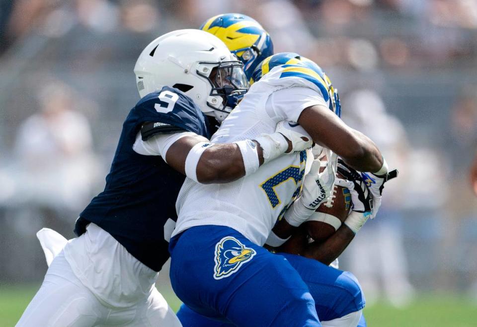 Penn State safety King Mack stops Delaware’s ball carrier during the game on Saturday, Sept. 9, 2023.