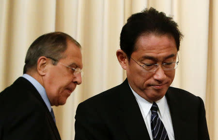 Russian Foreign Minister Sergei Lavrov (L) and his Japanese counterpart Fumio Kishida attend a news conference after the talks in Moscow, Russia, December 3, 2016. REUTERS/Sergei Karpukhin