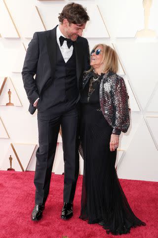 Chelsea Lauren/Shutterstock Bradley Cooper and his mom Gloria Campano at the 2022 Oscars.