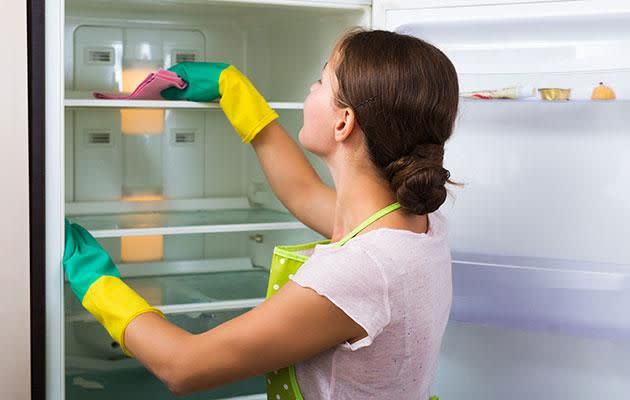 The dreaded fridge clean out. Photo: Getty