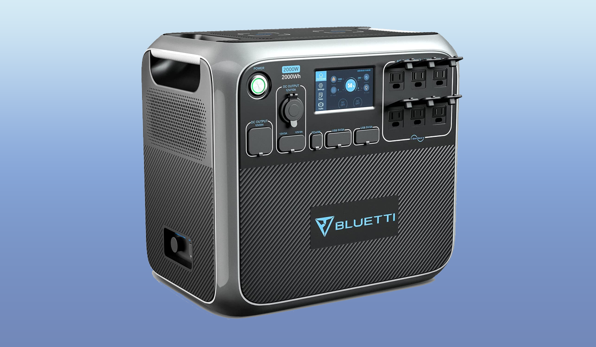 The Bluetti AC200P power station shown from the front at an angle. It has 12 ports, a power button, and digital screen on the front.