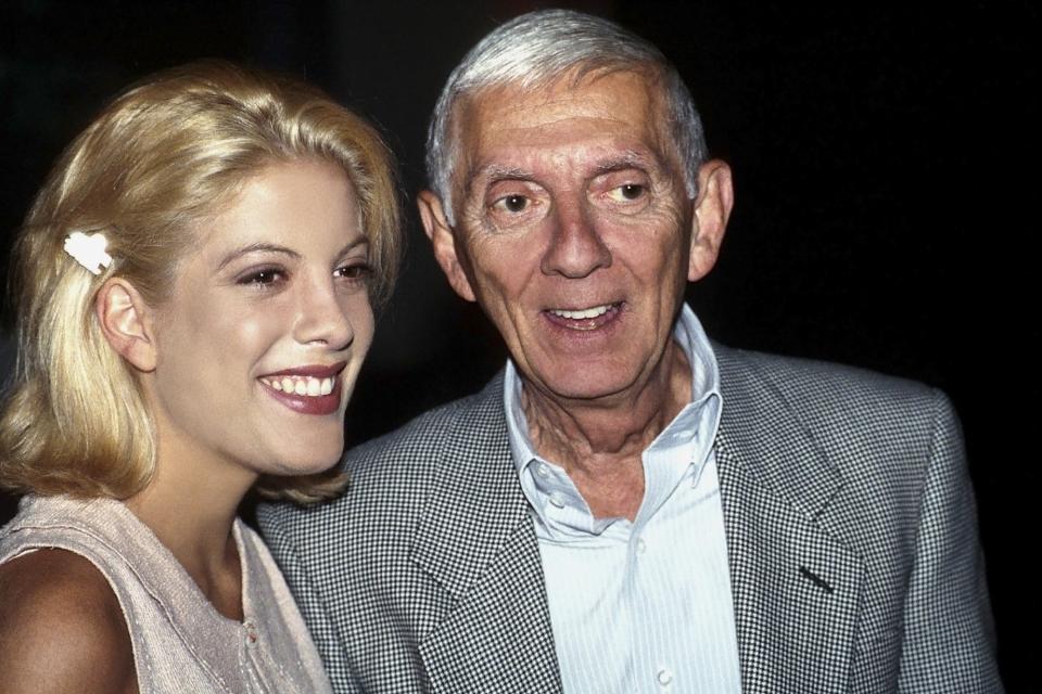 Tori Spelling and Aaron Spelling smiling