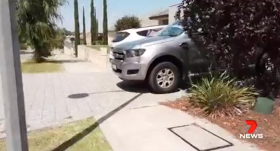 His car sticks out over the footpath about 60cm and is barely enough to trouble most pedestrians, but Brad Hill has been warned he is breaking the law. Source: 7 News