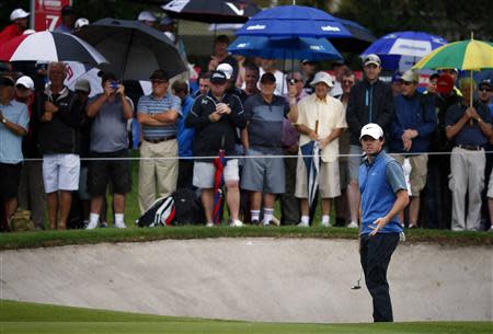 Northern Ireland's Rory McIlroy prepares to putt on the ninth hole during the second round of the Australian Open golf tournament at Royal Sydney Golf Club November 29, 2013. REUTERS/David Gray