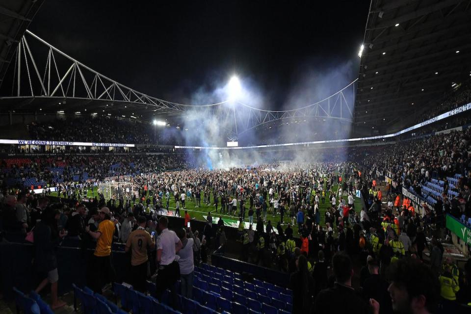 Bolton Wanderers fans poured on to the pitch after the final whistle <i>(Image: Camerasport)</i>