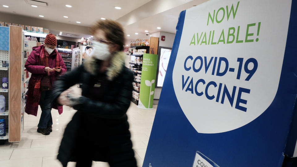 A billboard at a pharmacy in Grand Central Terminal in New York City on Dec. 9 advertises COVID-19 vaccinations. 
