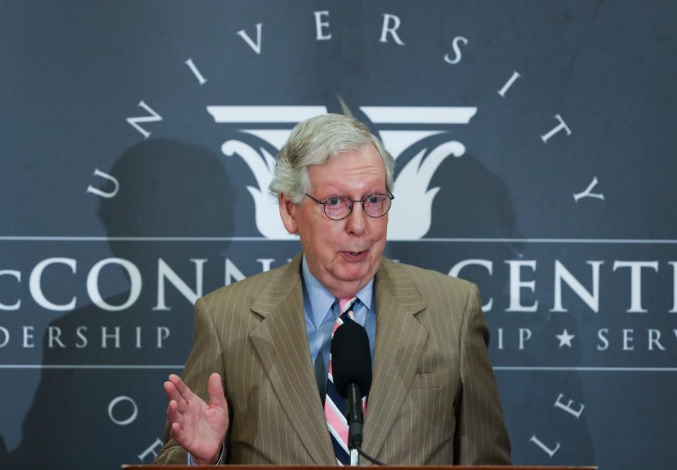 Sen. Mitch McConnell introduced Arizona Sen. Kyrsten Sinema before she took the stage to make remarks about bipartisanship during an event at the McConnell Center on the campus of the University of Louisville in Louisville, Ky. on Sept. 26, 2022.  