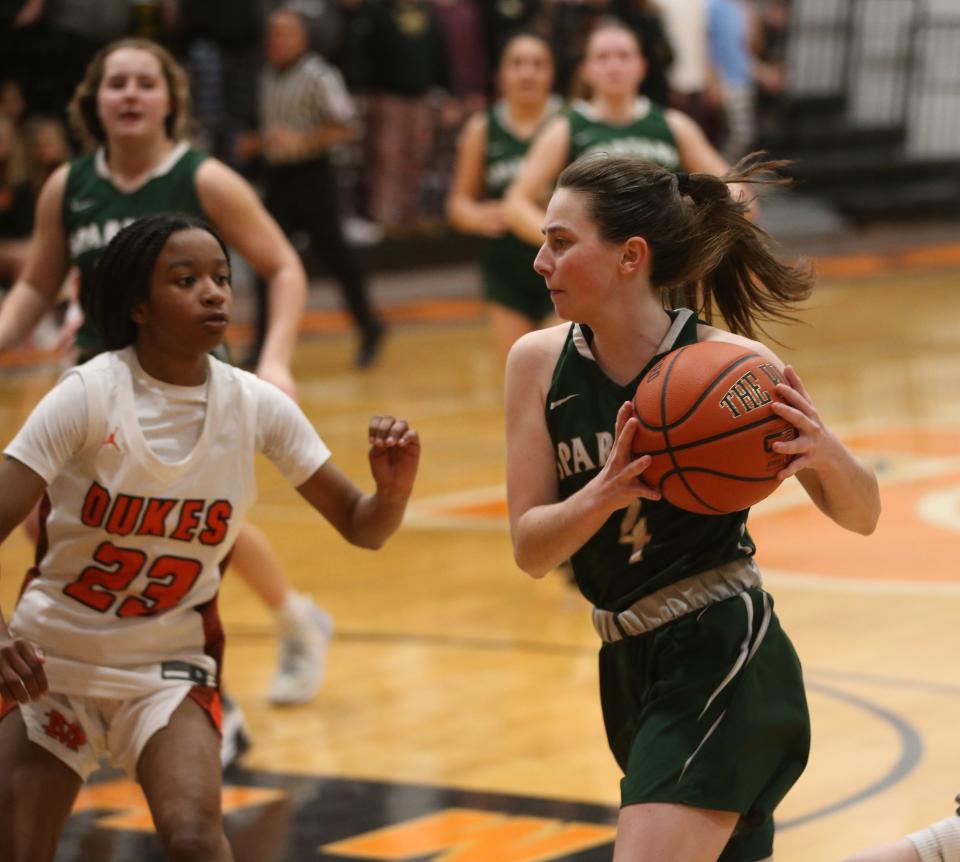 Spackenkill's Blythe McQuade is guarded by Marlboro's Nalyah Campbell during a Feb. 16, 2023 girls basketball game.