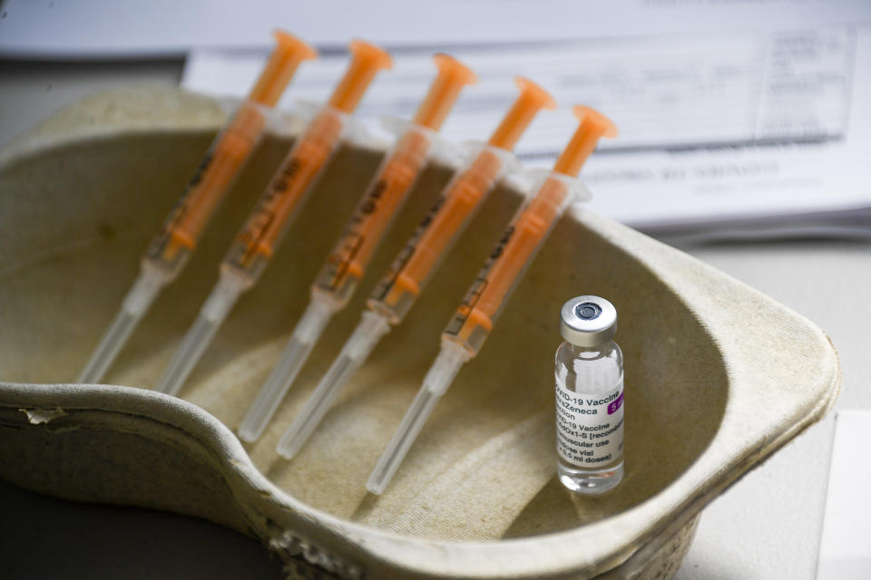 FILE - In this Sunday, March 21, 2021 file photo a vial and syringes of the AstraZeneca COVID-19 vaccine, at the Guru Nanak Gurdwara Sikh temple, in Luton, England. People under 40 in Britain will not be given the Oxford-AstraZeneca coronavirus vaccine if another shot is available because of a link to extremely rare blood clots, it was announced Friday, May 7. The Joint Committee on Vaccination and Immunization said people under 40 without underlying health conditions should receive an alternative vaccine if its does not cause substantial delays in being vaccinated.(AP Photo/Alberto Pezzali, File)