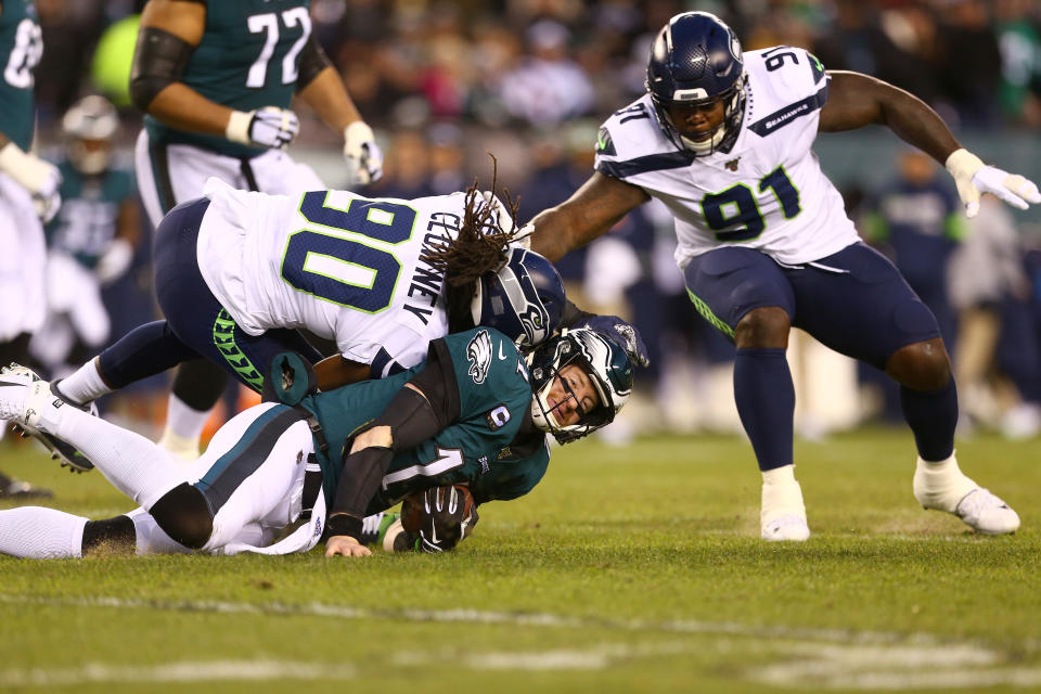 Officials declined to flag Jadeveon Clowney for a direct blow to the back of Carson Wentz's head. (Mitchell Leff/Getty Images)