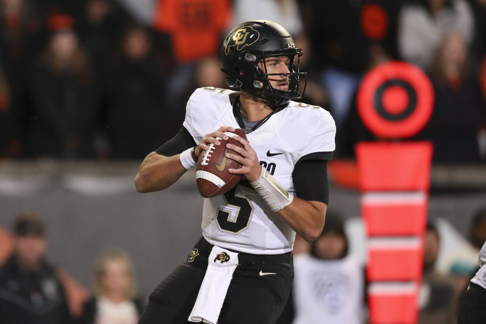Colorado quarterback J.T. Shrout drops back to pass against Oregon State during the first half of an NCAA college football game on Saturday, Oct. 22, 2022, in Corvallis, Ore. (AP Photo/Amanda Loman)