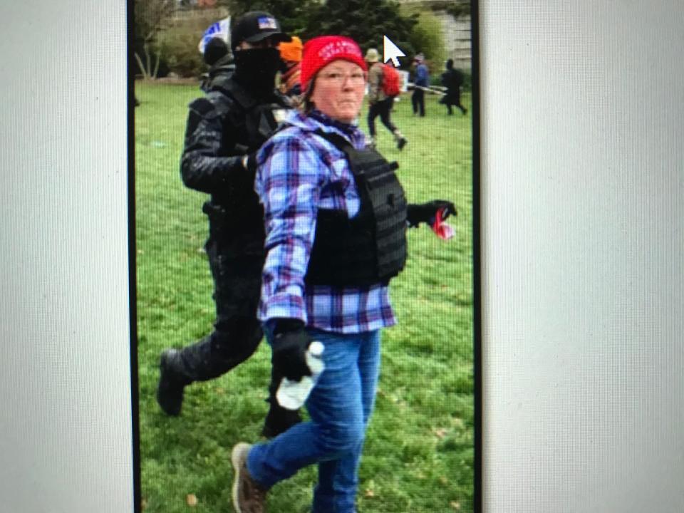 A photograph authorities believe is Lisa Eisenhart with son Eric Munchel on the grounds of the U.S. Capitol.