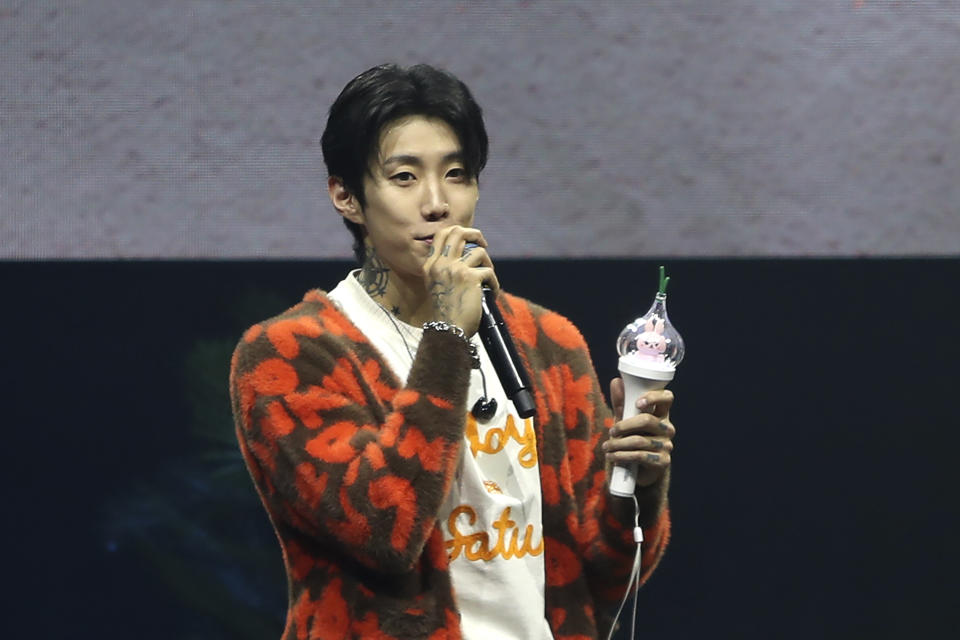 Korean American star Jay Park shows the garlic light stick of his fandom on stage during a fan meeting at Myunghwa Live Hall on Sunday, Aug 11, 2024, in Seoul. (AP Photo/Juwon Park)