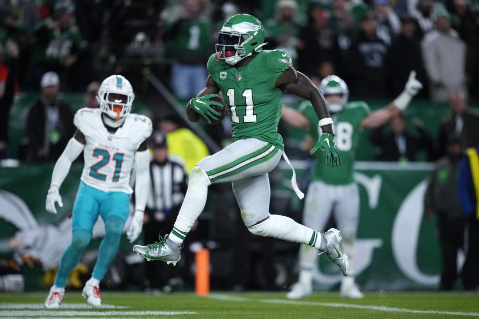 Philadelphia Eagles wide receiver A.J. Brown (11) scores a touchdown during the second half of an NFL football game against the Miami Dolphins, Sunday, Oct. 22, 2023, in Philadelphia. (AP Photo/Matt Slocum)