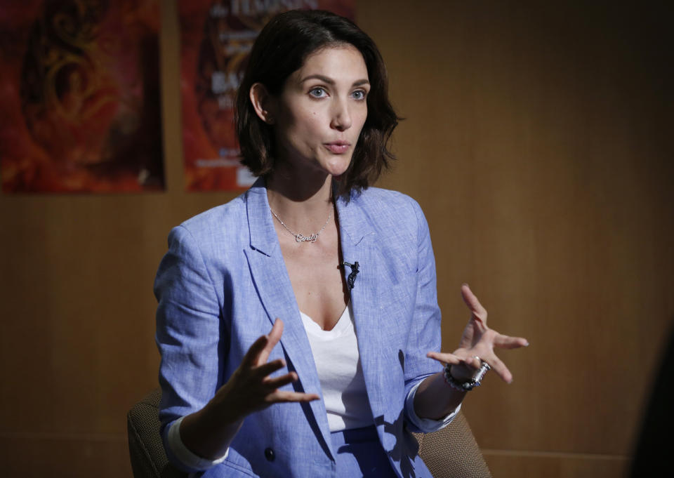 In this March 16, 2019, photo, Cindy Bishop speaks during an interview with the Associated Press in Bangkok, Thailand. Bishop launched the Don't Tell Me How To Dress campaign, after her viral social media post about women being told to cover up to avoid sexual assault. The #MeToo movement in entertainment isn't just an American phenomenon. Cases across Asia show the region is grappling with many of the same issues that have upended entertainment careers in the U.S. (AP Photo/Sakchai Lalit)