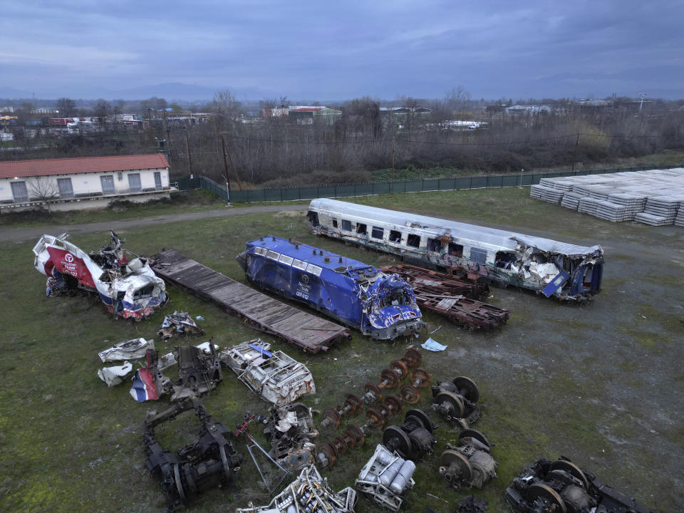 An aerial view of the wagons and other parts recovered from a train wreck, near Larissa city, central Greece, Wednesday, Feb. 28, 2024. Greece's deadliest rail disaster killed 57 people when a passenger train slammed into an oncoming cargo train. The tragedy shocked the country, with many of the victims being university students. (AP Photo)