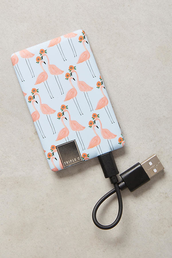 Paired Flamingos Triple C Power Card Ultra Thin Charger, $36, <a href="https://www.anthropologie.com/shop/paired-flamingos-triple-c-power-card-ultra-thin-charger?category=phone-cases-tech&amp;color=045" target="_blank">Anthropologie</a>