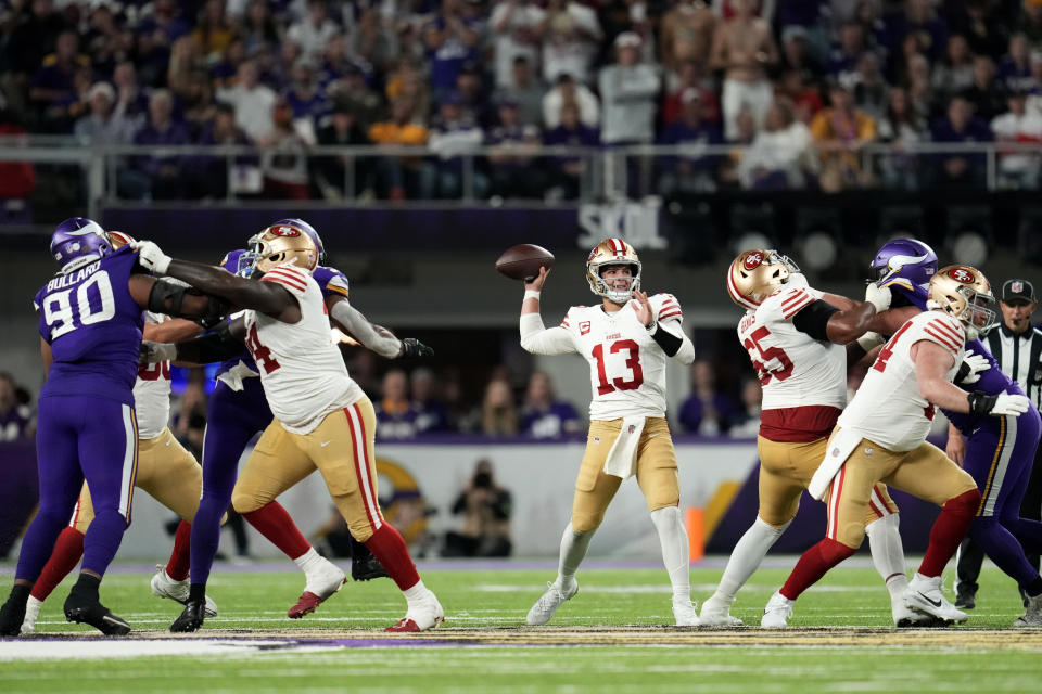 San Francisco 49ers quarterback Brock Purdy (13) throws a pass during the second half of an NFL football game against the Minnesota Vikings, Monday, Oct. 23, 2023, in Minneapolis. (AP Photo/Abbie Parr)
