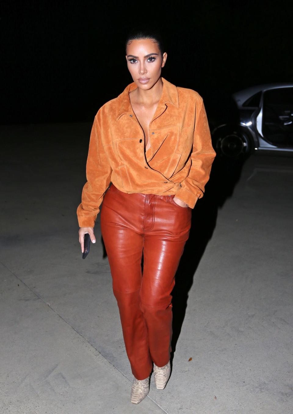 <p>Kim Kardashian West steps out in Malibu on Tuesday wearing a suede and leather ensemble. </p>