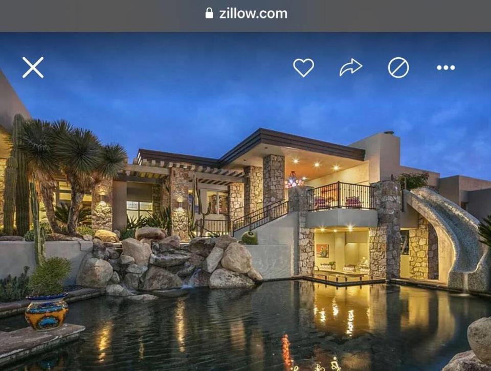 The backyard has a water park vibe. Screengrab from Zillow/MLS